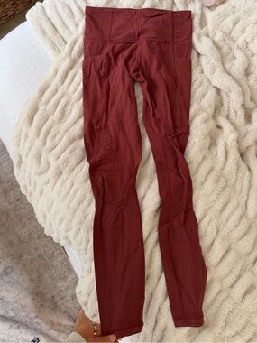 Athleta Stash Pocket Salutation Tight
